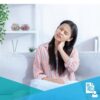Asian woman with neck pain