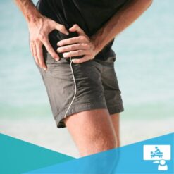 Man grabbing the side of his hip