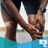 A person holding their knee