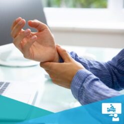 man with Carpel Tunnel Syndrome holding his wrist