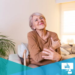 Elderly woman in chronic pain massaging her shoulder
