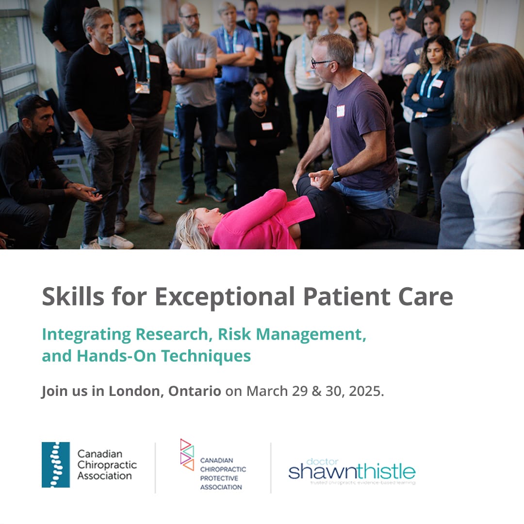 Picture of a chiropractor instructing his colleagues with information about a conference on March 29-30