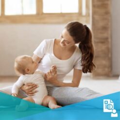 Athletic young mother stretching with her little baby at home